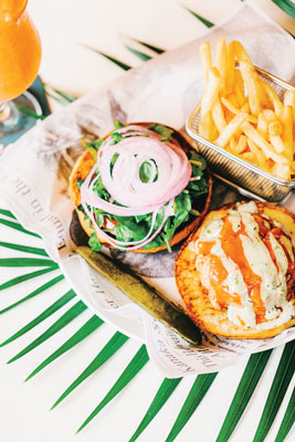 Order the pulled pork sandwich on Hawaiian sweet bread with fries for lunch at Duke’s. Photo by Hawaii Tourism Authority (HTA).