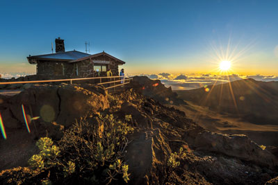 The sun rises over Haleakala. Shutterstock.