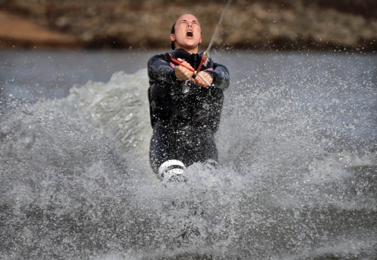 <strong>Stephanie Stooks braces against the cold as she slalom skis during the 43rd annual Ski Freeze at the Mud Island River Park on Jan. 1, 2020. Hosted by the Collierville Ski Club, water skiers, barefooters and wakeboarders braved the frigid water of the Wolf River to raise money for The Dream Factory of Memphis which grants wishes for critically and chronically ill children ages 3 through 18.</strong> (Jim Weber/Daily Memphian)