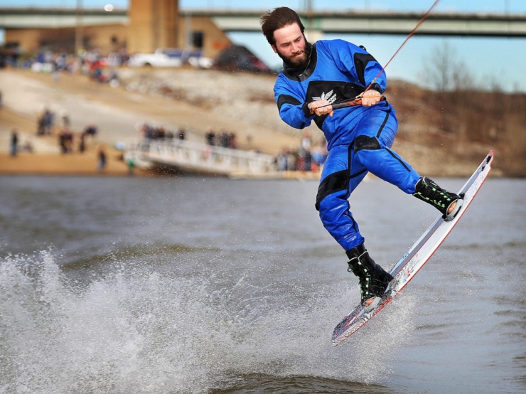 <strong>Drew Williams catches some air while wakeboarding during the 43rd annual Ski Freeze at the Mud Island River Park on Jan. 1, 2020. Hosted by the Collierville Ski Club, water skiers, barefooters and wakeboarders braved the frigid water of the Wolf River to raise money for The Dream Factory of Memphis which grants wishes for critically and chronically ill children ages 3 through 18.</strong> (Jim Weber/Daily Memphian)