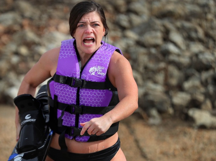 <strong>Kelsey Lawrence reacts to the cold after emerging from her dip in the Wolf River during the 43rd annual Ski Freeze at the Mud Island River Park on Jan. 1, 2020. Hosted by the Collierville Ski Club, water skiers, barefooters and wakeboarders braved the frigid water of the Wolf River to raise money for The Dream Factory of Memphis which grants wishes for critically and chronically ill children ages 3 through 18.</strong> (Jim Weber/Daily Memphian)