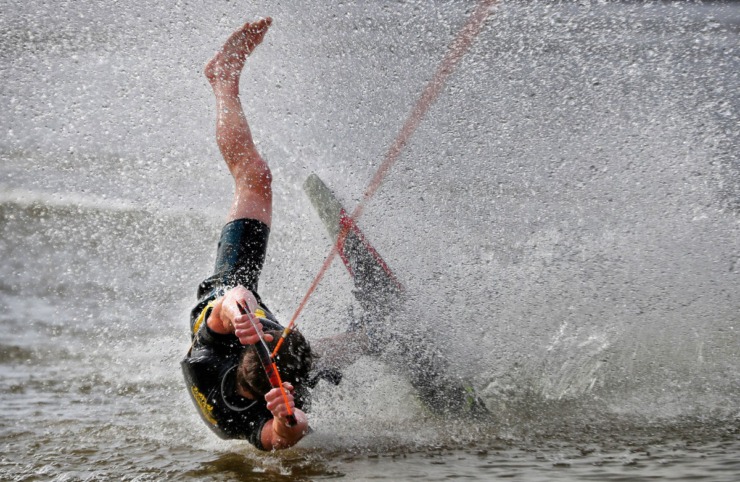 <strong>Blake Maynard takes a tumble during the 43rd annual Ski Freeze at the Mud Island River Park on Jan. 1, 2020. Hosted by the Collierville Ski Club, water skiers, barefooters and wakeboarders braved the frigid water of the Wolf River to raise money for The Dream Factory of Memphis which grants wishes for critically and chronically ill children ages 3 through 18.</strong> (Jim Weber/Daily Memphian)