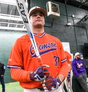 Clemson sophomore pitcher Davis Sharpe (30) swings in the batting cages during the first official team Spring practice at Doug Kingsmore Stadium in Clemson Friday, January 24, 2020.