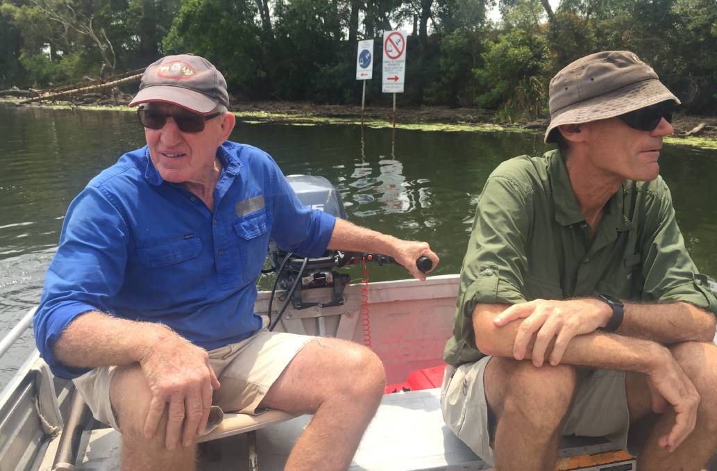 CONCERNED: Williams River Care Association members Digby Rayward and Brian Ness inspect the banks.