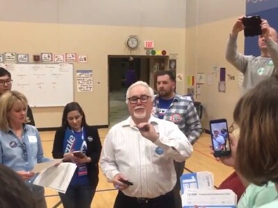 Watch: Coin tosses decide democracy in Iowa Democratic caucuses