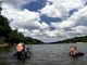 State underwater archeologist Roger Smith, left, and FSU graduate student Bert Ho take a break while searching for artifacts at a site on the Apalachicola River. (2002)