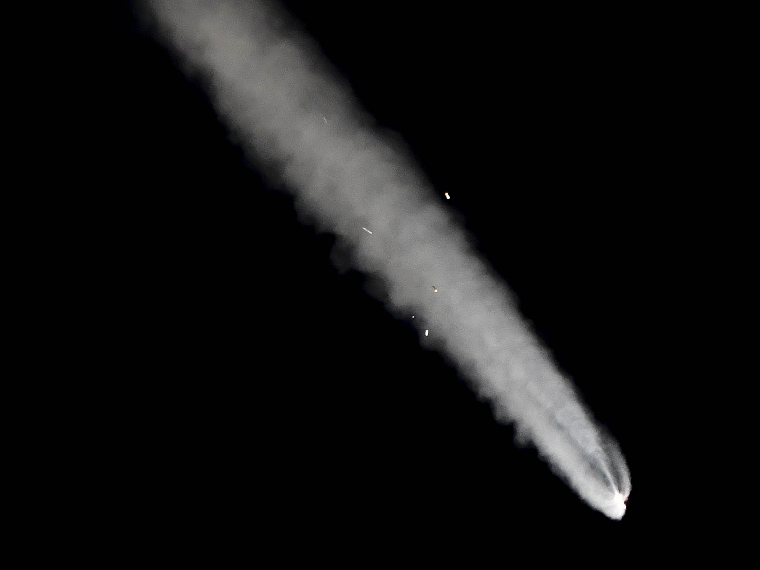 The solid rocket boosters are reflected in the sun after a United Launch Alliance Atlas V rocket lifts off from Cape Canaveral Air Force Station early Thursday morning, Aug. 8, 2019. The rocket is carrying the AEHF 5 communications satellite for the U.S. military.