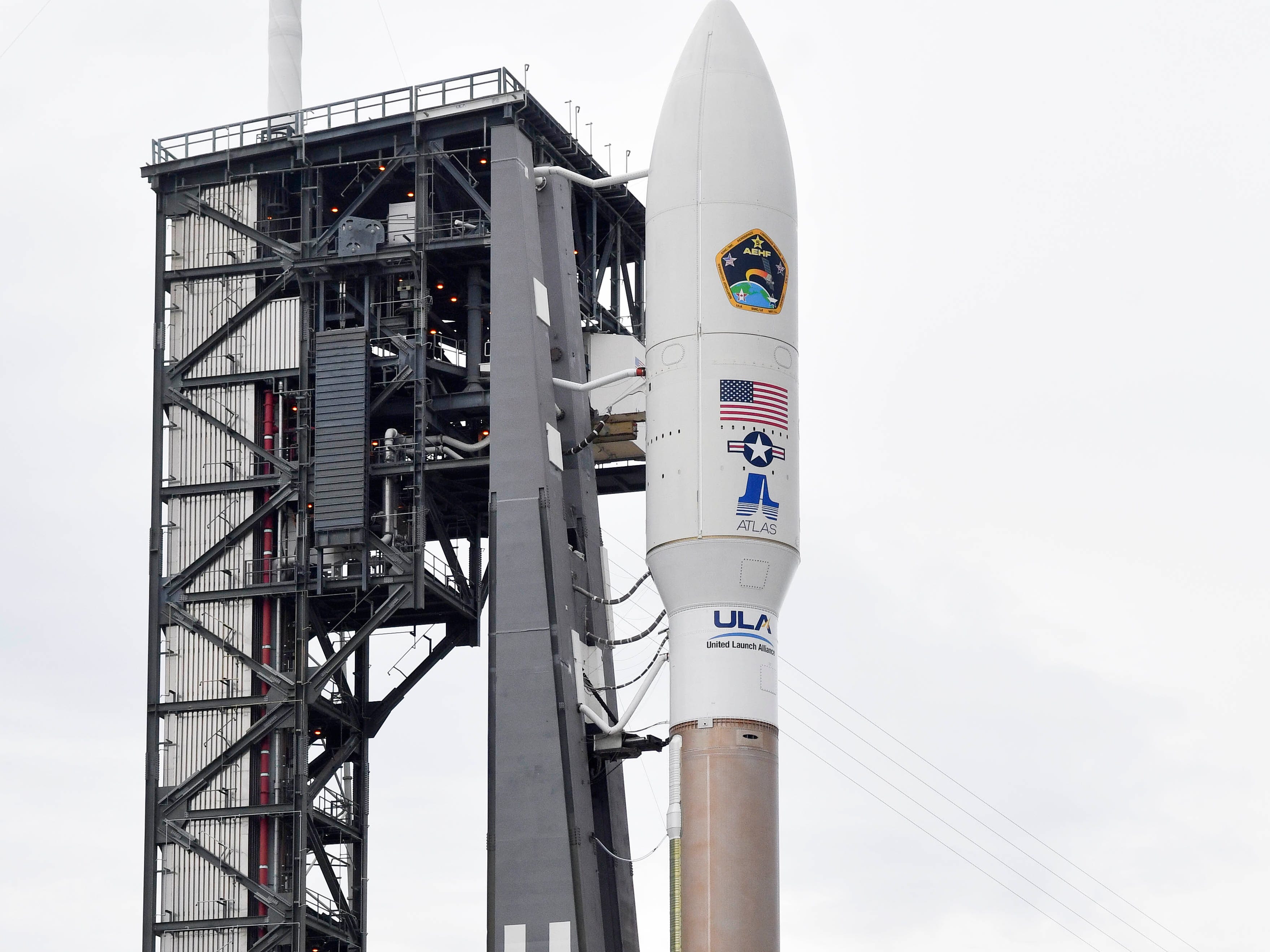 Photographers set up remote cameras in advance of tonight's launch of a United Launch Alliance Atlas V rocket from Cape Canaveral Air Force Station. The rocket is carrying the AEHF 5 communications satellite for the U.S. military. Mandatory Credit: Craig Bailey/FLORIDA TODAY via USA TODAY NETWORK