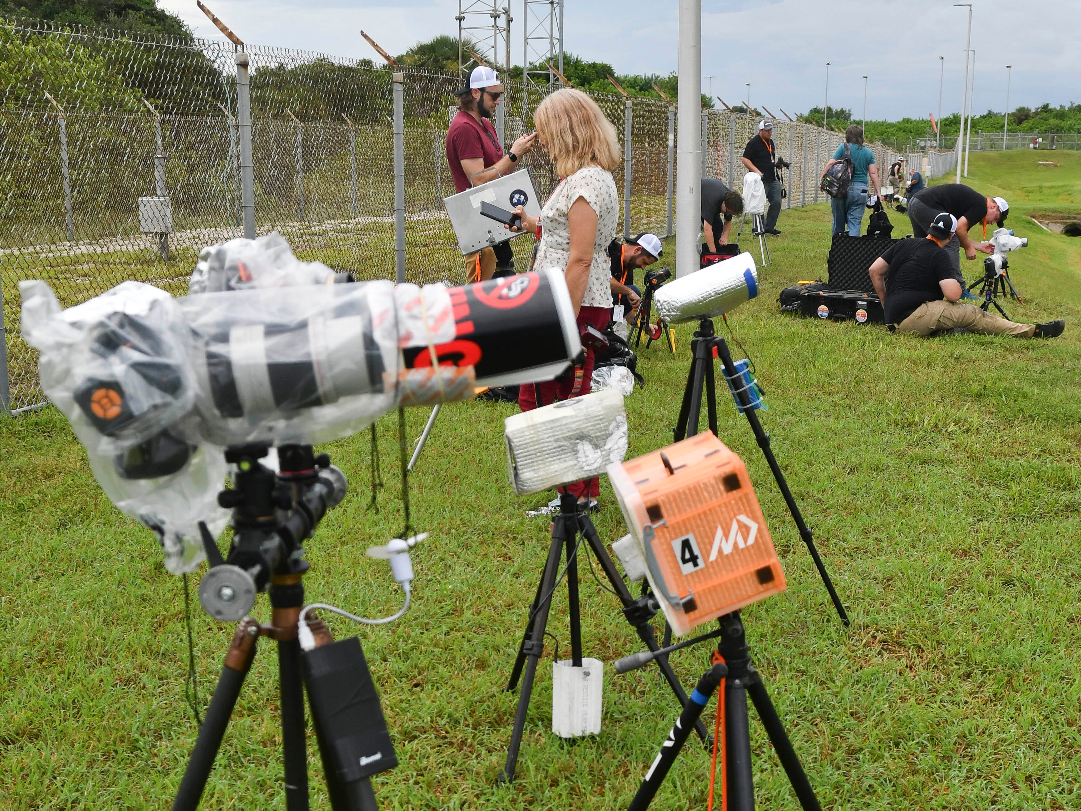 Photographers set up remote cameras in advance of tonight's launch of a United Launch Alliance Atlas V rocket from Cape Canaveral Air Force Station. The rocket is carrying the AEHF 5 communications satellite for the U.S. military.