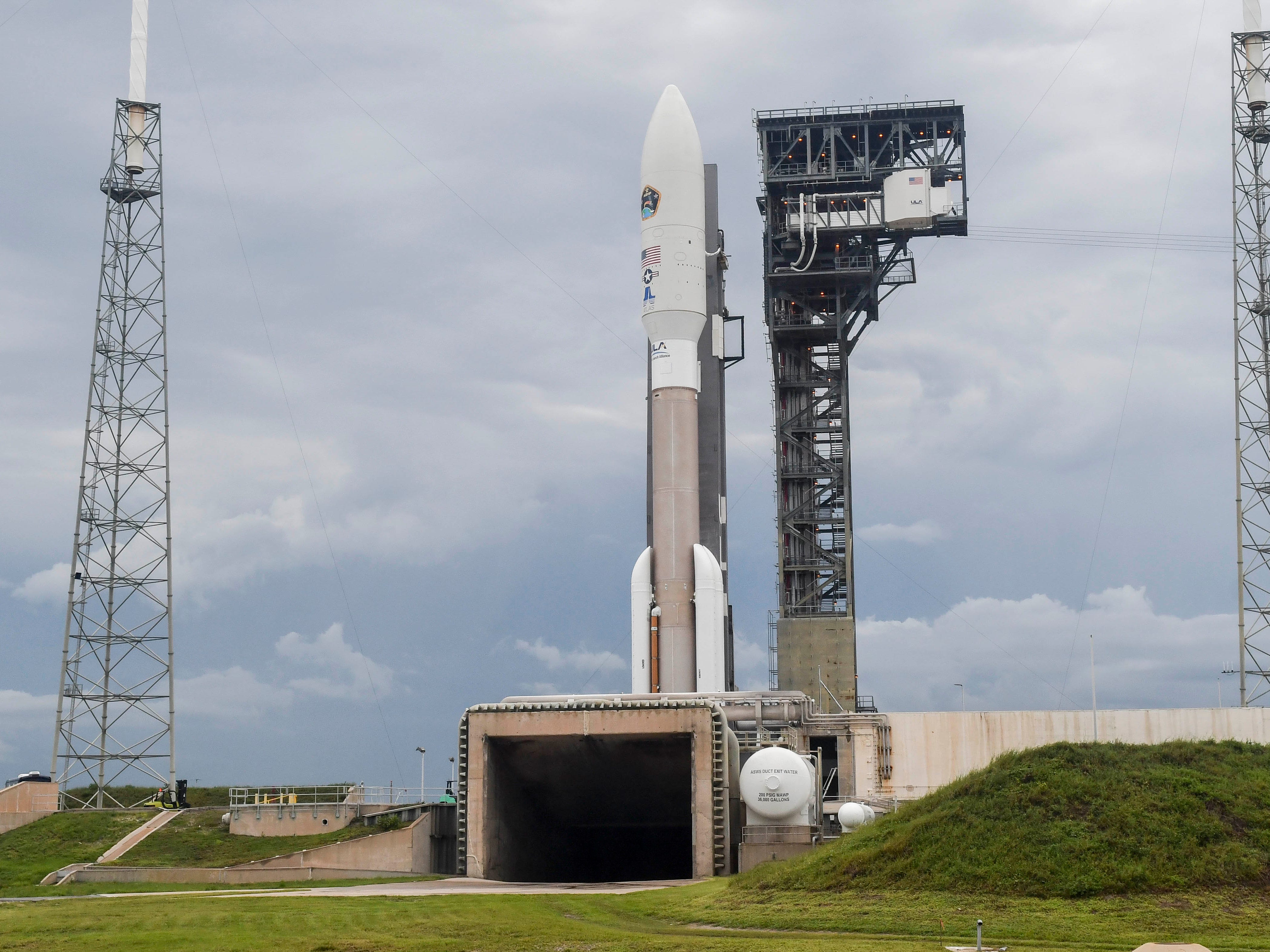 Photographers set up remote cameras in advance of tonight's launch of a United Launch Alliance Atlas V rocket from Cape Canaveral Air Force Station. The rocket is carrying the AEHF 5 communications satellite for the U.S. military.