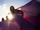 Marguerite Barnett spins in circles, sending her cape into the air during the community drum circle at Siesta Key Beach on Sunday, January 21, 2018 in Sarasota. The weekly tradition started in 1996 and draws a crowd of performers and spectators. 