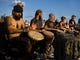 Drummers keep the beat together during the community drum circle at Siesta Key Beach on Sunday, January 21, 2018 in Sarasota. 