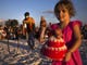 Hula hoopers, dancers, and kids run around during the community drum circle at Siesta Key Beach on Sunday, January 21, 2018 in Sarasota.