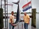 Bob Thomas (left), Manasquan, and Joe Loverde, Manalapan, caught this 315-pound mako shark on June 25. It took a little over an hour and a half to land the fish, which was weighed in at Hoffman?s in Brielle.