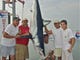 The crew of the Marlintini with the 298-pound mako that won the 2012 Mako Fever.