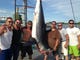 Capt. Jared Polick (second from left) and the crew of Fin-Ominal, with the 466.8-pound mako shark that took first place in the Brett Bailey Mako Rodeo and the Warriors for Warriors Charity Shark Tournament, both held last Saturday.