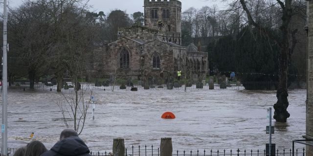 A view of a flooded street, in Appleby-in-Westmorland, as Storm Ciara hits the UK, in Cumbria, England, Sunday Feb. 9, 2020.