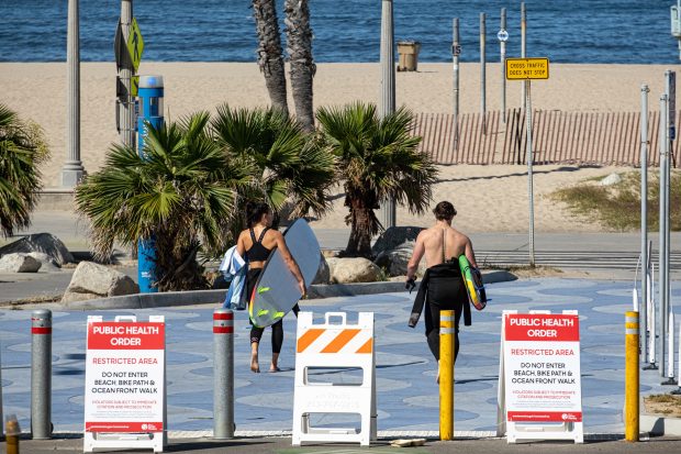 Beachgoers hit surf and sand as L.A. County beaches partially reopen – The Daily Breeze