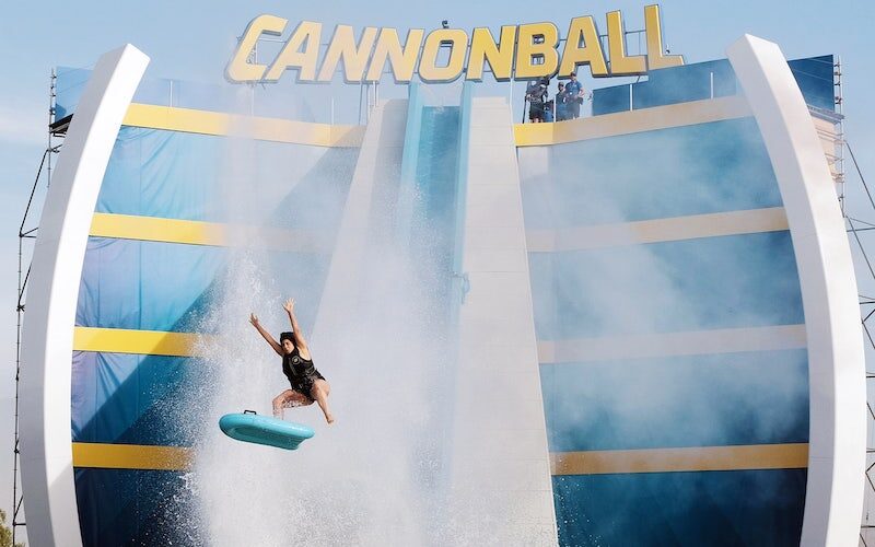 A contestant flies off the end of the megaslide, the centerpiece challenge on Cannonball