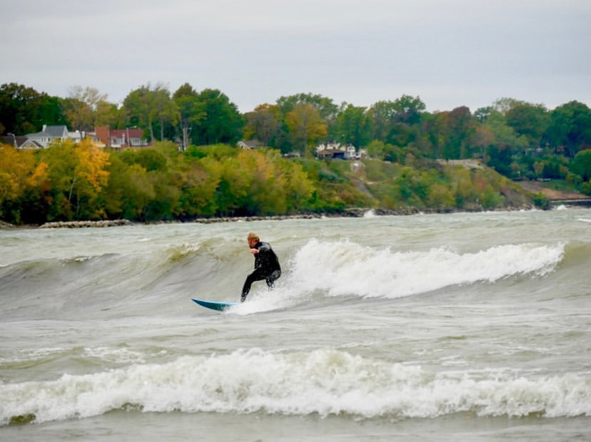 Chris Kish, Elyria native, catches a wave at Edgewater Beach.