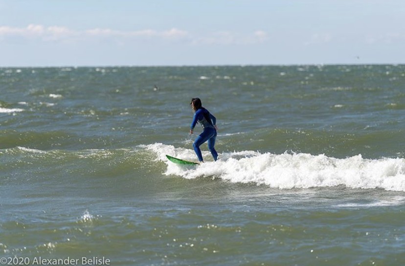 Cat Carrillo catches some waves on Lake Erie.