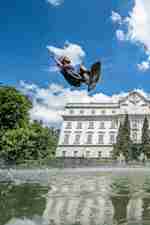 Wakeboarder Dominik Hernler preforms a jump in the lake at the Leopoldskron Palace in Salzburg, Austria during filming of his video Sound of Wake.