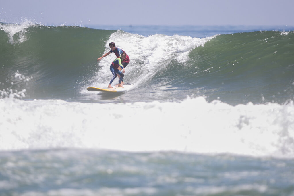 ALO Longboard Classic Sees Big Surf, New Level of Longboard Surfing – The SandPaper