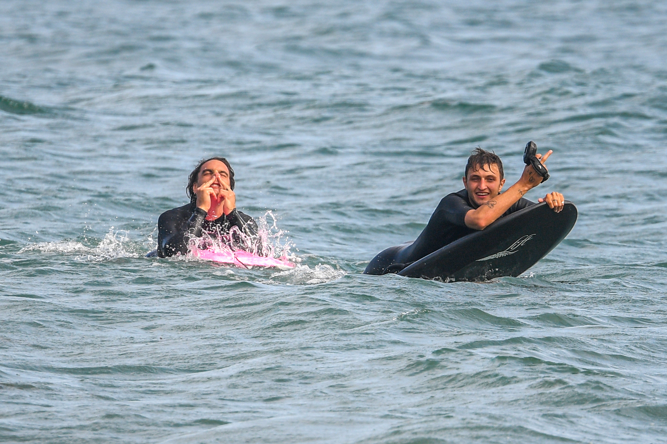 Dua and her boyfriend Anwar Hadid have a blast surfing in Malibu