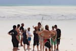 Luke Denny teaching kitesurfing to students in Zanzibar.