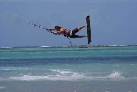 A photo of a person kite surfing