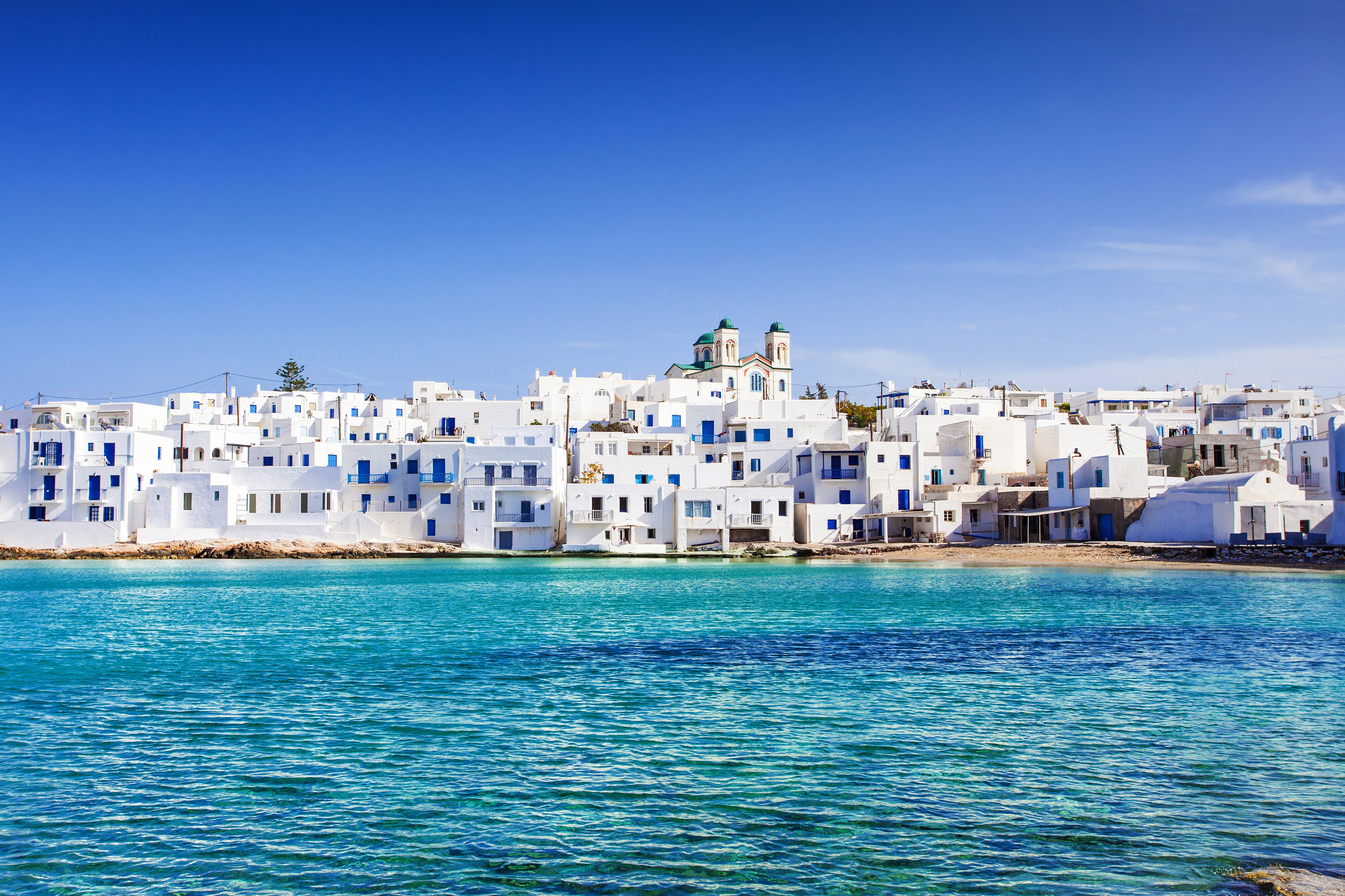 Paros is a picture-perfect getaway of blue-domed chapels, pristine beaches, colourful fishing ports and quintessential villages, like Naousa, pictured