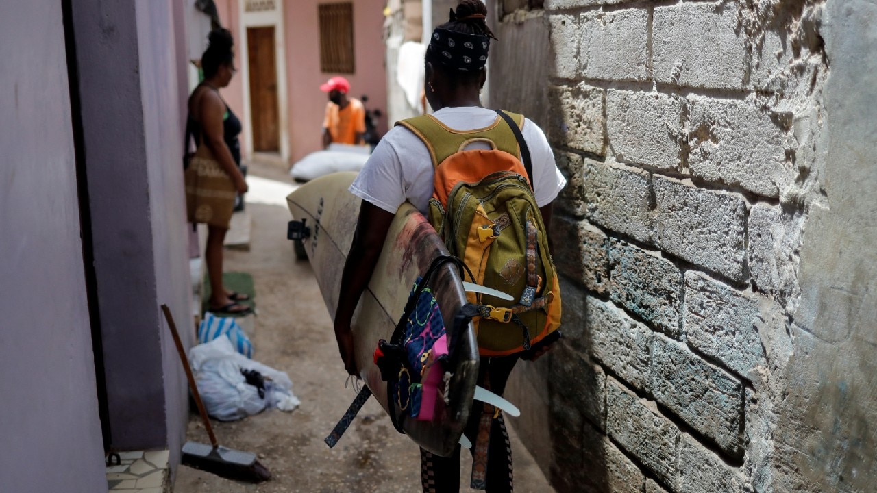 Sambe said, "I would always see people surfing and I'd say to myself: but where are the girls who surf?" She said. "I thought: why don't I go surfing, represent my country, represent Africa, and represent Senegal as a Black girl?" (Image: Reuters)