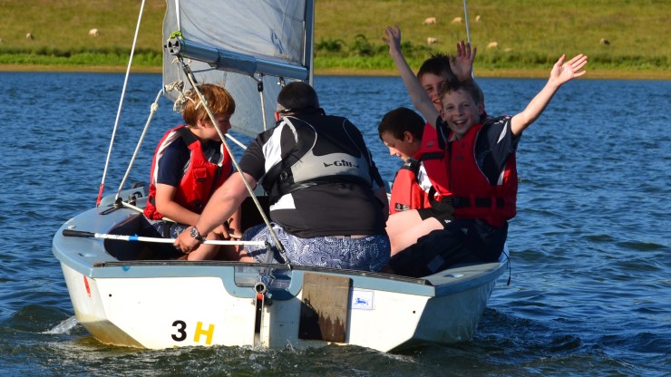 A pre lockdown OnBoard taster session with children enjoying being out in a boat at Hollowell SC, credit Hollowell SC