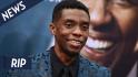 Chadwick Boseman wearing a suit and tie