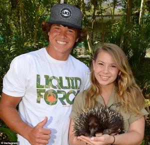 Bindi Irwin et al. posing for the camera: First love: The couple met close to seven years ago in November 2013 when Chandler, who hails from Florida, was touring Australia for a wakeboarding competition