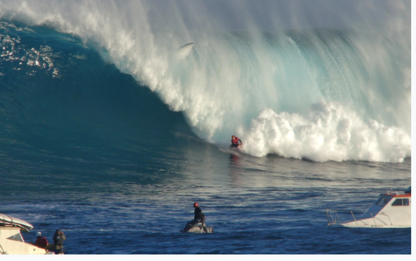 Andrew Karr finishes a ride on a big wave on a body board in Hawaii earlier this year.