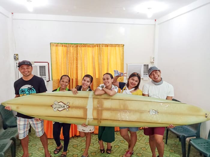 Branzuela (far left) with Falter's board, and family.