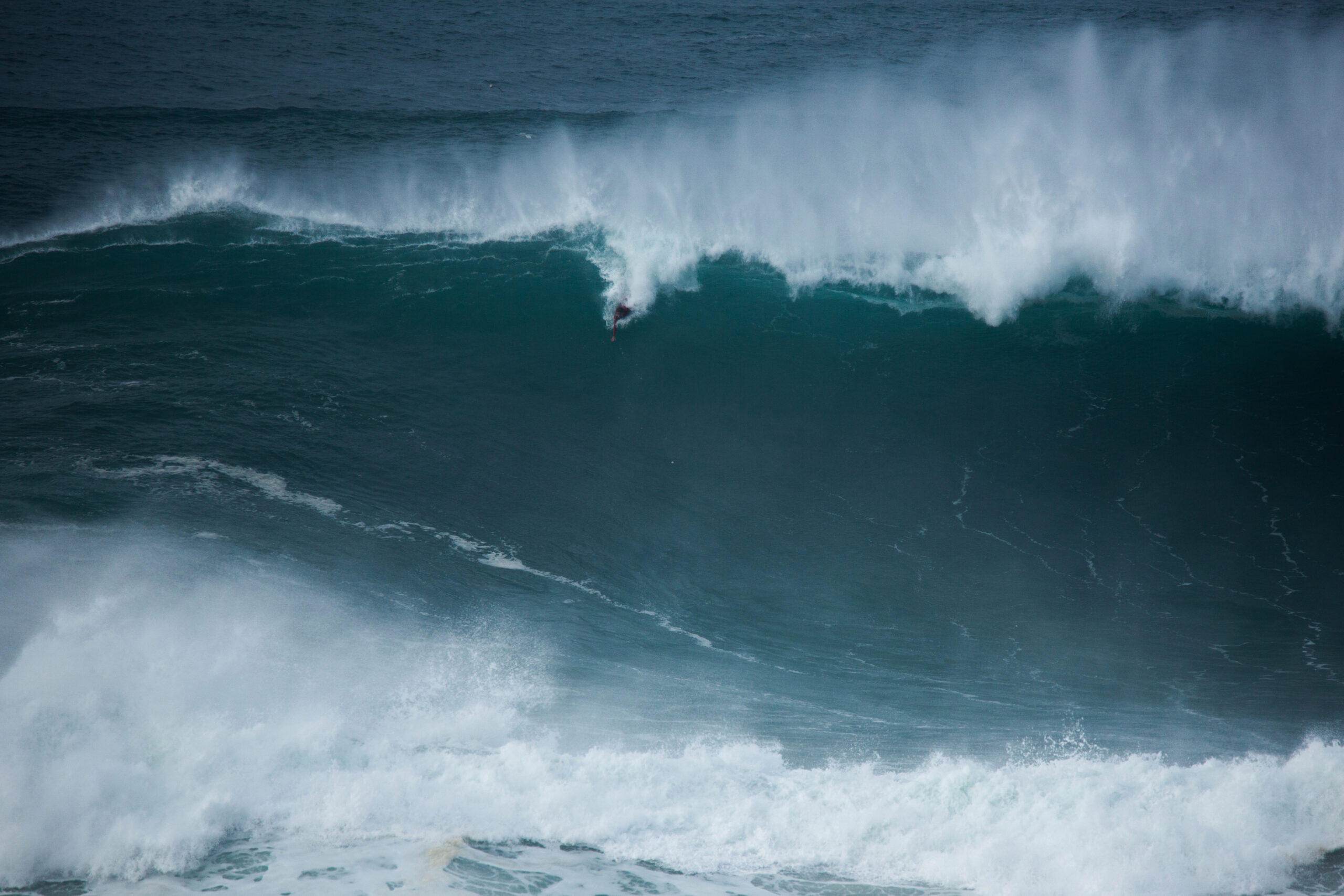 The Man Who Surfs the World’s Biggest Waves Without a Board – InsideHook