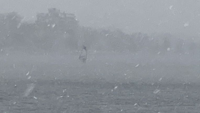 Video: Man seen windsurfing on Minneapolis lake during snowstorm – FOX 9